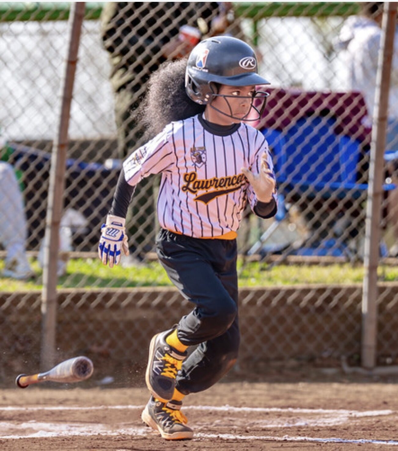Noah dropping the bat, taking off out of the box